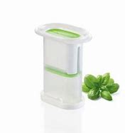 Press for frozen herbs